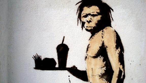 Caveman with fast food by Banksy. Licensed under CC BY 2.0. Source: Lord Jim https://www.flickr.com/photos/lord-jim/2245362817