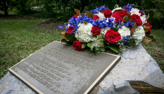 Memorial plaque on Keohane Quad that honors the six alumni killed in the 9/11 attacks.