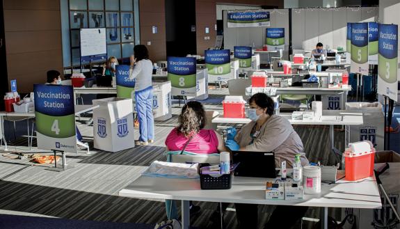 Morning sunshine pours through windows of Blue Devil Tower club area, where staff and faculty receive the COVID-19 vaccine.