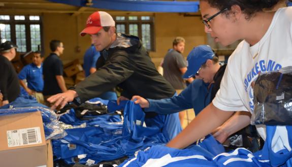 Shoppers look through items at the 2017 Duke Athletics surplus sale.