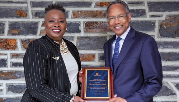 Duke University Chancellor for Health Affairs Eugene Washington, right, presents Gloria Johnson Bass, with the Susan B. Clark Administrative Leadership Award. Photo courtesy of Duke Health.