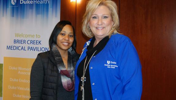 Teunille Irons, left, and Mary Beth Fry, right, of Duke Specialty Clinics at Brier Creek go to great lengths to look after patients. Photo by Stephen Schramm.