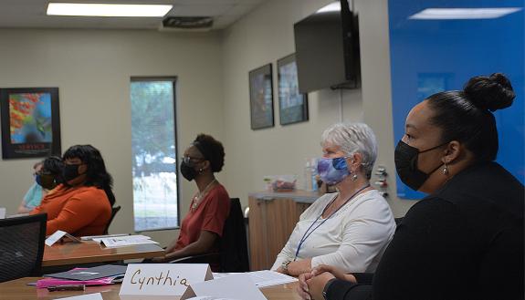 Members of the Certified Executive Administrative Professional program listen to a presentation. Photo by Stephen Schramm.