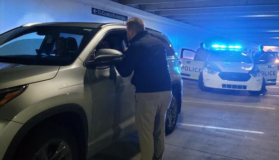Participants in the Duke Citizens Police Academy, a popular part of the Duke University Police Department's community outreach efforts, take part in a simulated traffic stop. Photo courtesy of the Duke University Police Department.