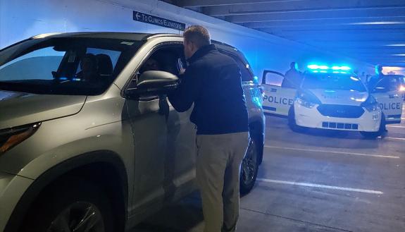 Participants in the Duke Citizens Police Academy, a popular part of the Duke University Police Department's community outreach efforts, take part in a simulated traffic stop. Photo courtesy of the Duke University Police Department.