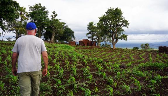 Charles Piot walks through a field in northern Togo. Photo courtesy of Charles Piot.