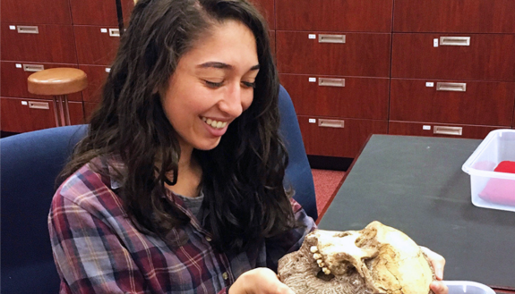 “This experience looks great on a resume and it’s very fulfilling to apply your narrow research topic to something outside of academia,” said Amanda Rossillo, pictured in her lab.