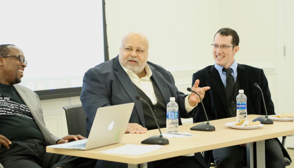 Conductor/Composer William Curry speaks at the panel while Mark Anthony Neal, left, and Jonathan Cooper join in the discussion. Photo by Catherine Angst