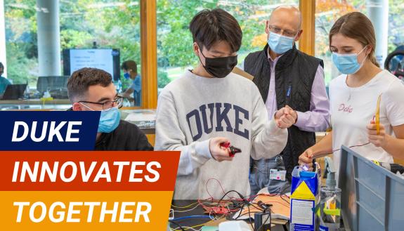 Duke scholars in a lab