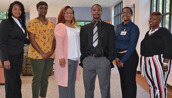 (Left to right) Gina Rogers, practitioner with Duke Learning & Organization Development, with Foundational Skills participants LaShaunda Freeman, Nicole Smith, George Johnson, Lamecka Wilkerson and Marquita Mangum.