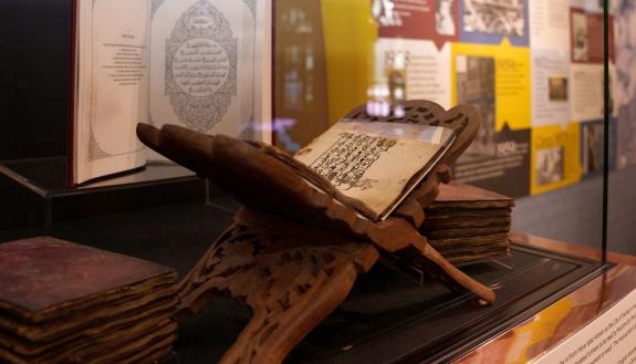 A handwritten copy of the Qur’an from Harar, also known as the City of Saints, in modern-day Ethiopia, is displayed as part of “The Transformational History of Ar-Razzaq Islamic Center in Durham.” 