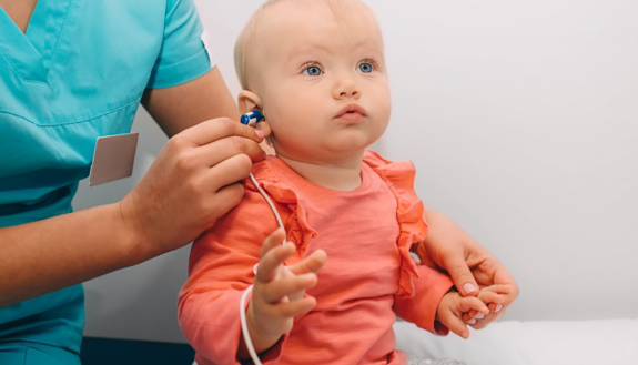 stock image of baby at a medical checkup