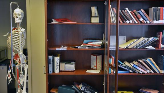 Bookshelves in the Duke Doctor of Physical Therapy Program office are emptying as staff members give away old textbooks and academic journals to students. 