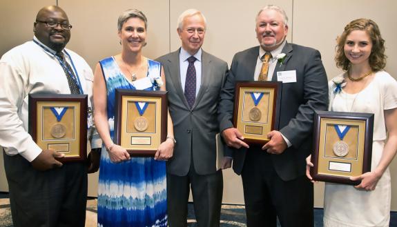 President Richard H. Brodhead, center, with Presidential Award winners. Not pictured: Amanda Kelso, Executive Director and Assistant Vice Provost, Global Education Office for Undergraduates. Photos by Chris Hildreth, Duke University Photograpghy.