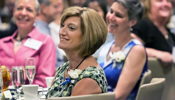 Guests and honorees watch the presentation of the 2016 Presidential Awards.