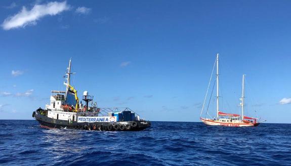 The Mare Jonio, left, has taken to sea in search of refugees in need.