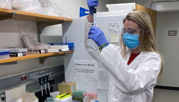 Lab Research Analyst Samantha Skavicus works n the lab of Nicholas Heaton. Photo courtesy of Nicholas Heaton.