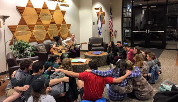 Students and staff partake in Shabbat Shira, a song session, before Shabbat services every Friday. Photo courtesy of the Freeman Center for Jewish Life.