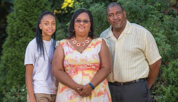 Theresa Johnson, center, visits Sarah P. Duke Gardens with her daughter, Tariah, and her husband, Johnny, who was diagnosed with cancer in 2011.