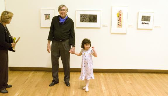 Irwin Kremen with his granddaughter at the opening of the 2007 Nasher Museum retrospective.