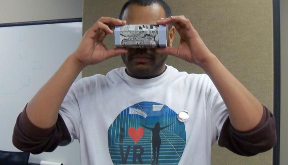 Mark McGill of OIT demonstrates a virtual reality tool at a spring demonstration.