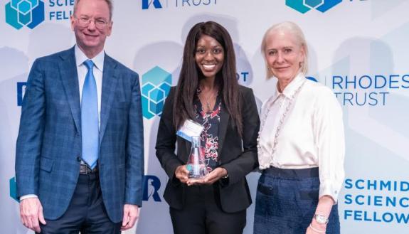 Mercy Asiedu with Eric and Wendy Schmidt. Photo by Adam Schultz.