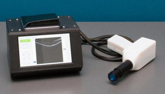 This OCT system designed at Duke University is 15 times lighter and smaller than current commercial systems and is made from parts costing less than a tenth the retail price of commercial systems.