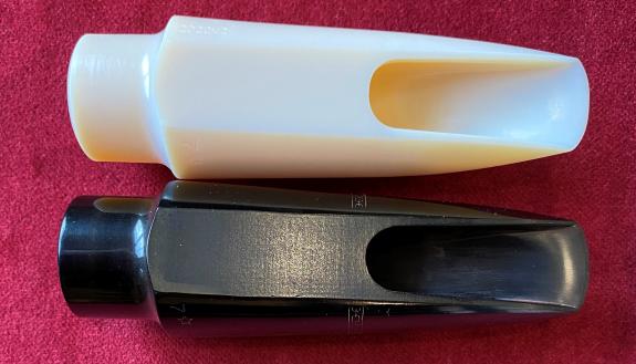 This replica of a vintage saxophone mouthpiece (top) was 3D printed using microCT scans of the original (bottom). Courtesy of Brian Curry.