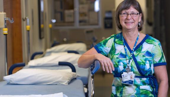Brett Dickinson, a nurse in Duke's Ambulatory Surgery Center, fell into the habit of watching and listening to the news every moment she could. 