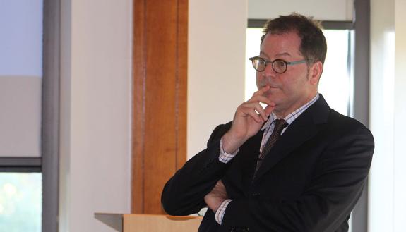 Seth Pollak takes a question during his discussion of poverty and childhood brain development.