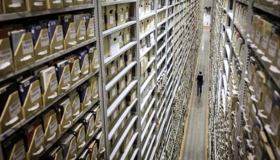 Shelves tower 30 feet above the Library Service Center’s aisles. Photo by Alex Boerner.