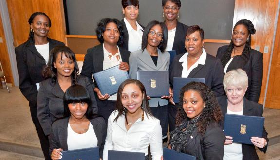 The eighth graduating class of the Professional Development Institute's Office Staff Development Program in 2014. Photo by Duke Photography. 