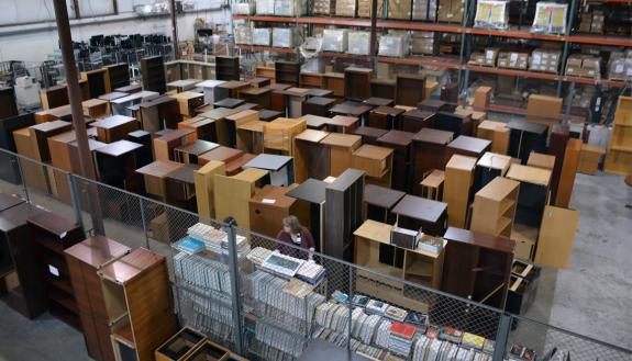 The Duke Surplus warehouse stores bookshelves, desks, chairs and other office supplies. Photo by Jonathan Black.