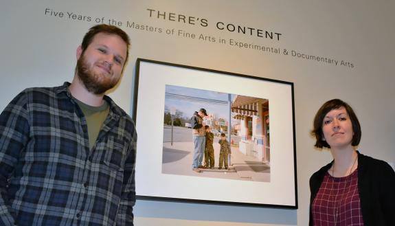 Alex Cunningham and Lisa McCarty stand in the Rubenstein Photography Gallery, which will house the “There’s Content” exhibit until June 20.  Cunningham curated the exhibit, which contains 23 photographs and six films celebrating the five-year anniversary 