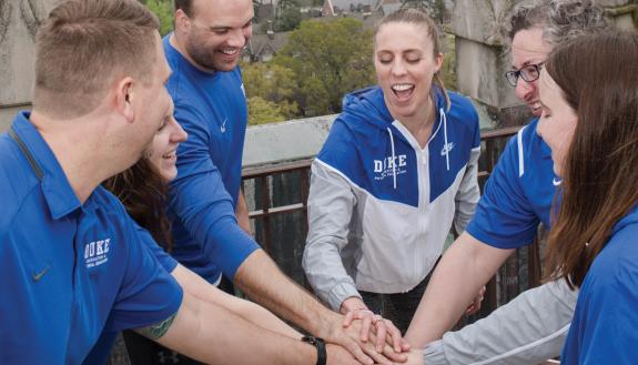 Duke Recreation & Physical Education staff members cheer after climbing 239 steps to the top of Duke University Chapel. Photos by Justin Cook.