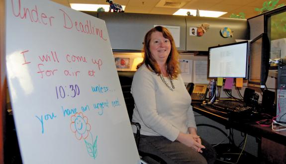In a strategy learned from the “Managing Multiple Priorities” course, Tracey Torain lets co-workers know when she’s doing tasks that need her undivided attention. 