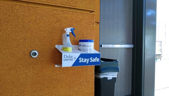 A classroom caddie affixed to a wall.