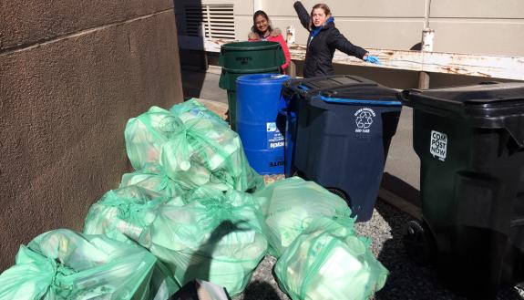 Student volunteers stand with some of the waste diverted from landfill during a K-Ville Zero Waste effort  during the 2019-20 season. Photo courtesy of Pooja Lalwani.