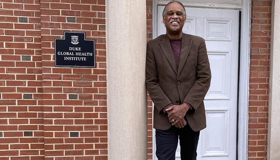 Alonzo Felder stands outside of the Duke Global Health INstitute's offices.