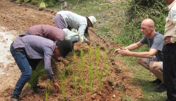  Boyd with rice planters in Cambodia