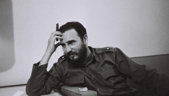 Fidel Castro in the Habana Libre Hotel, answering questions and writing to the ambassador to France, part of the Deena Stryker Collection in the Rubenstein Library