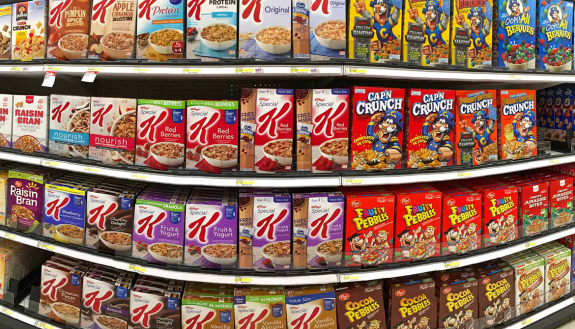 Racks of cereal in a grocery store