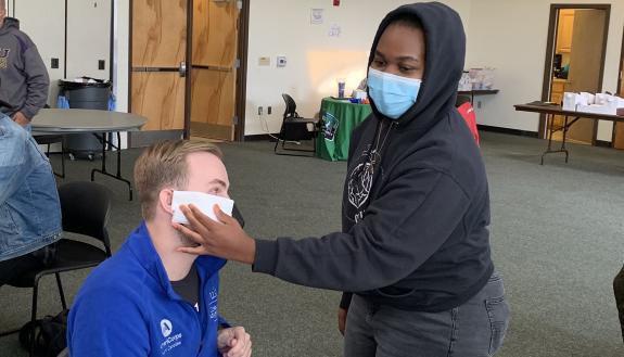 Trevor Anderson and Bernice Meja practice emergency triage during the CERT training