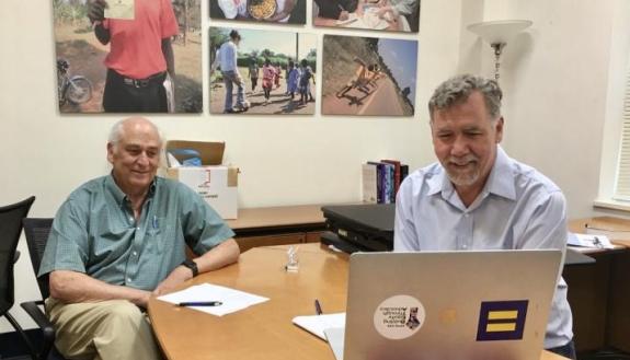 Chris Beyrer, right, with interim DGHI director Dennis Clements
