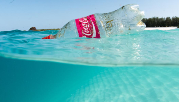 coke bottle in ocean