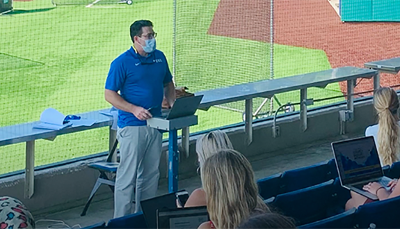 Eric Green teaches in Coombs baseball field