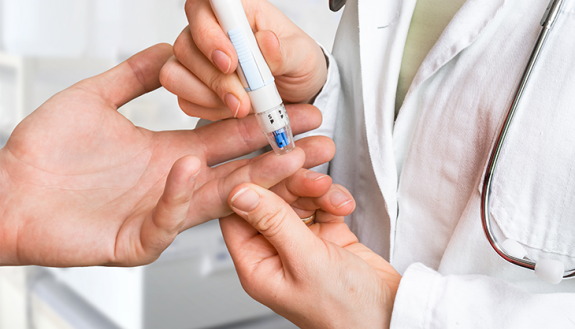 a finger prick to measure blood sugar