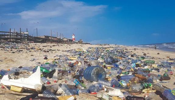 plastic dumped on the beach following Hurricane Diana