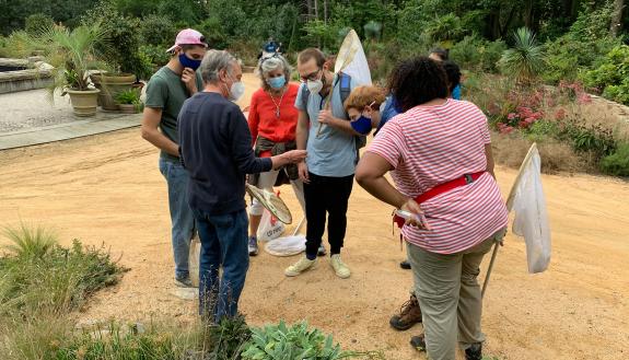 An entomology class checks out one of the many different insect species found in Duke Gardens.