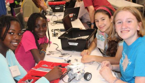 One of the activities at Girls STEM Day at Duke challenged participants to build their own robots using Lego’s Mindstorm EV3 kits, animate them using the free EV3 programmer app on laptops, and remotely steer their bots to perform tasks and compete in gam